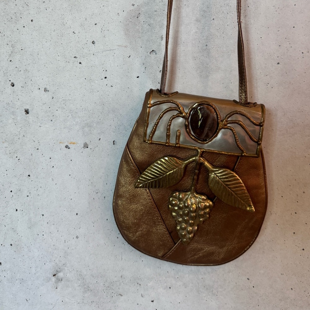 Vintage sculptural metal mini purse